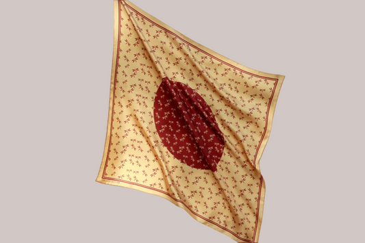 Golden 60cm silk scarf with a auburn dragonfly design on a beige background
