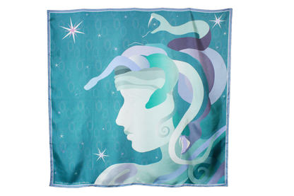 A large square silk scarf, Halcyon Medusa by The Line Atelier, featuring a stylized profile of a Medusa's face with flowing snake hair in shades of teal, purple, and white, set against a starry turquoise background.