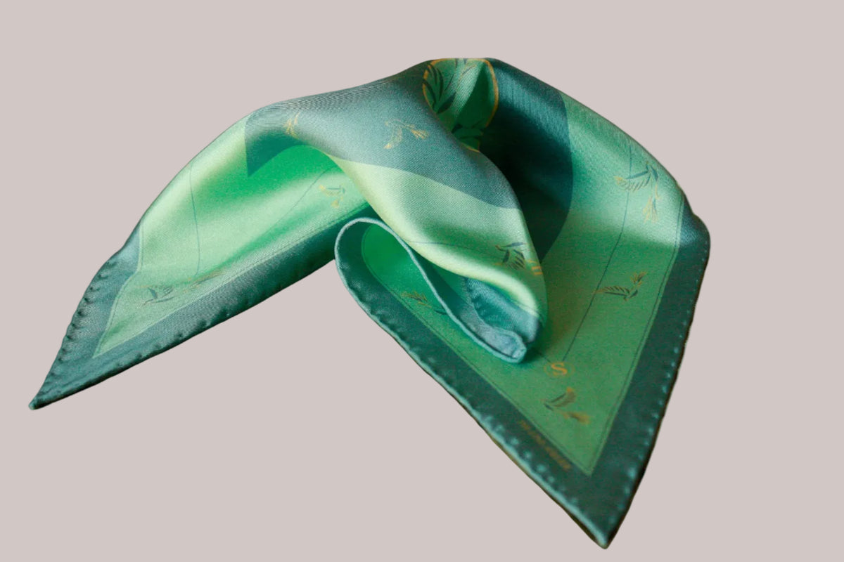 Rogues Compass by The Line Atelier green silk scarf diamond size with swallows is gold lineart